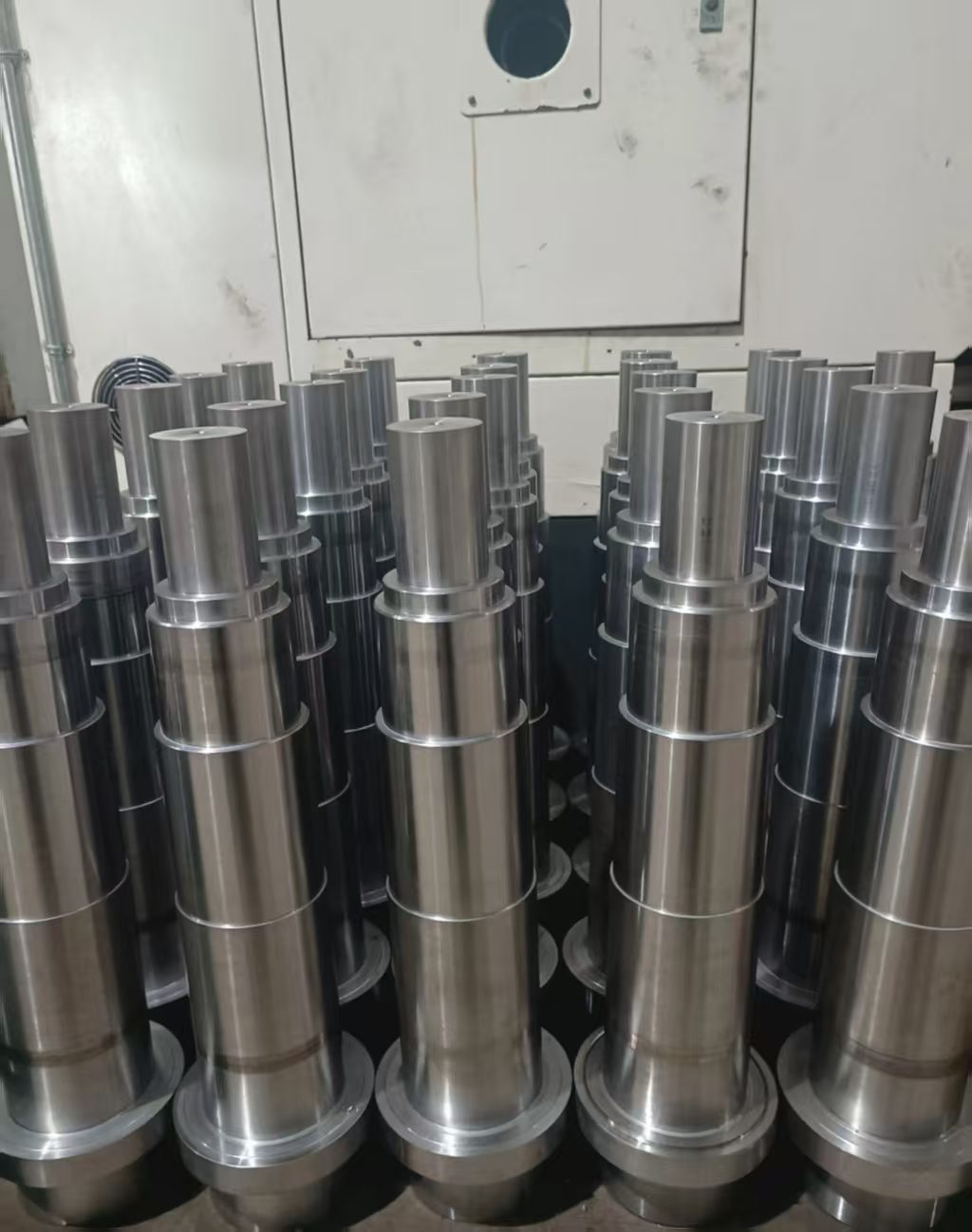 Finished turned shafts in workshop